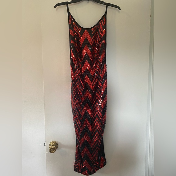 Dresses & Skirts - Ablyn Fashion, black and red sequins dress.